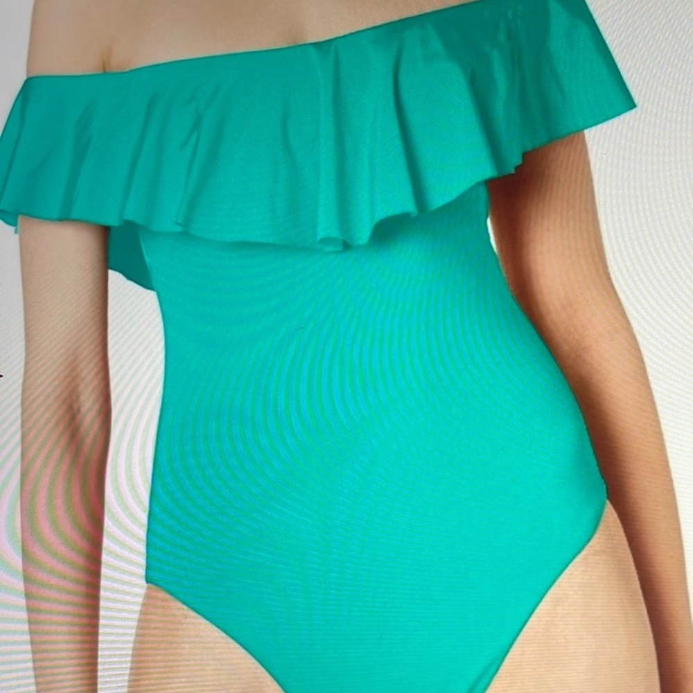 NWT Trina Turk one piece bathing suit in size 8 in blue